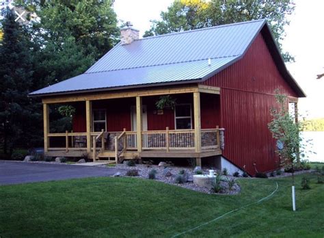 metal house with porch|metal cabin homes.